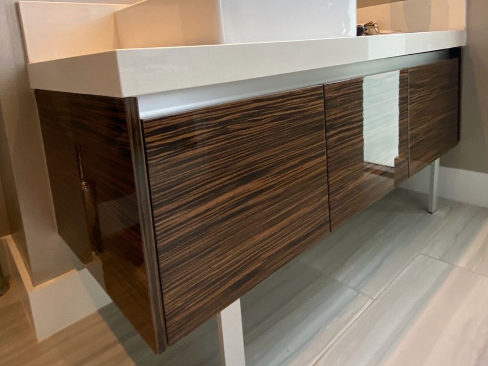 Floating guest vanity before resurfacing, high gloss macassar doors