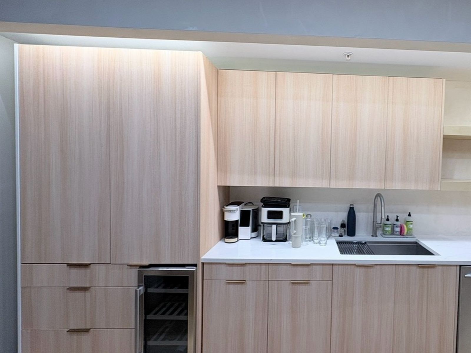 Butler's pantry after resurfacing, blonde wood cabinet fronts